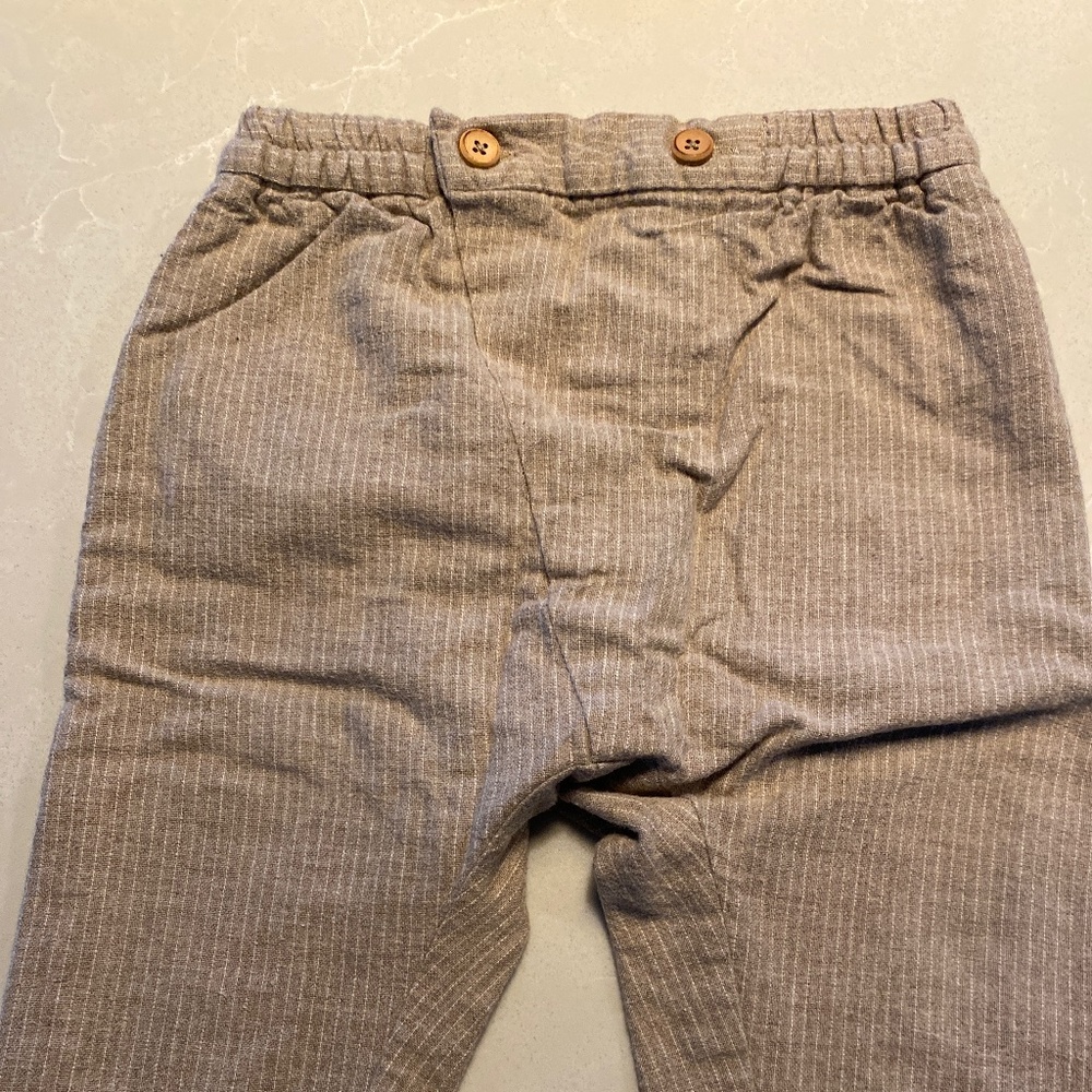 Striped pants with wood buttons